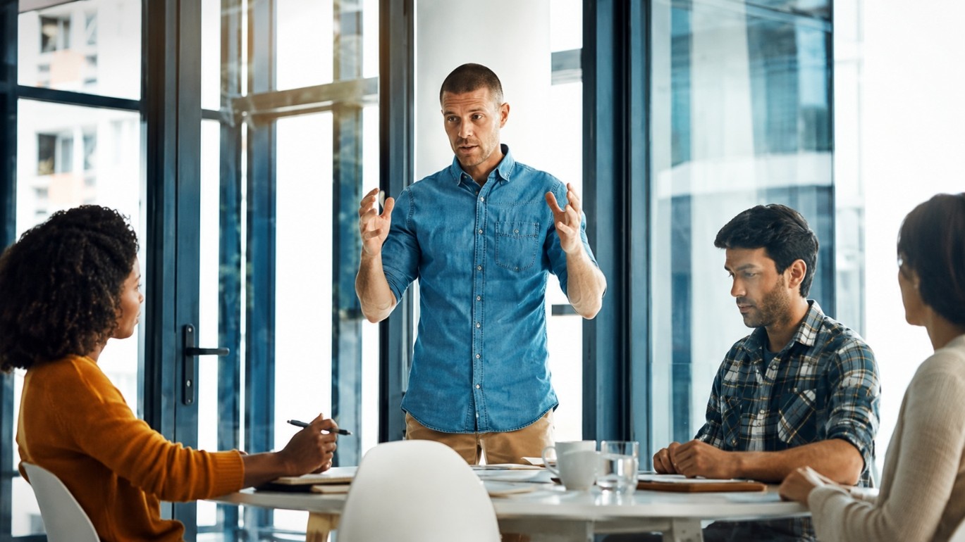 Business team discussing the hidden costs of an outdated website